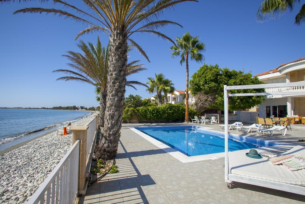 Meneou Beachfront Villa Sunset 皮尔瓦利亚 客房 照片